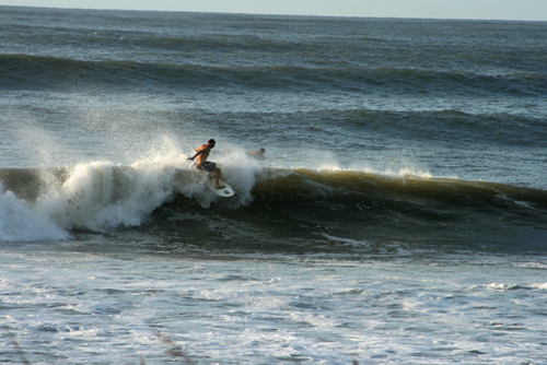 surfing at Folly Beach, SC